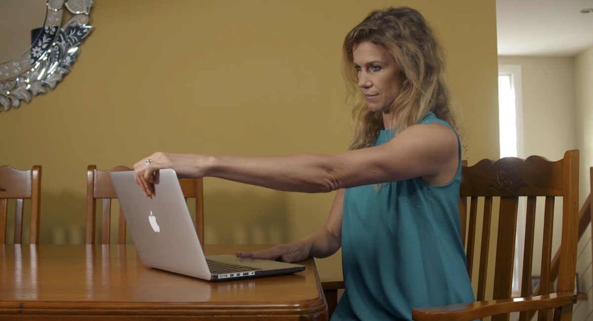 Woman contacting PestXpert on laptop