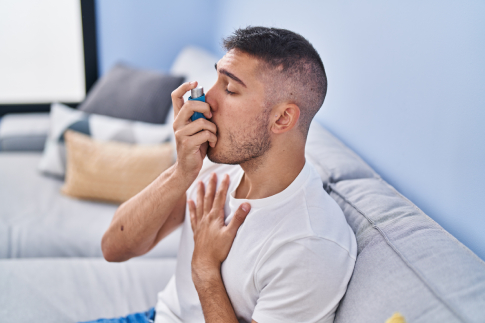 man with an asthma inhaler